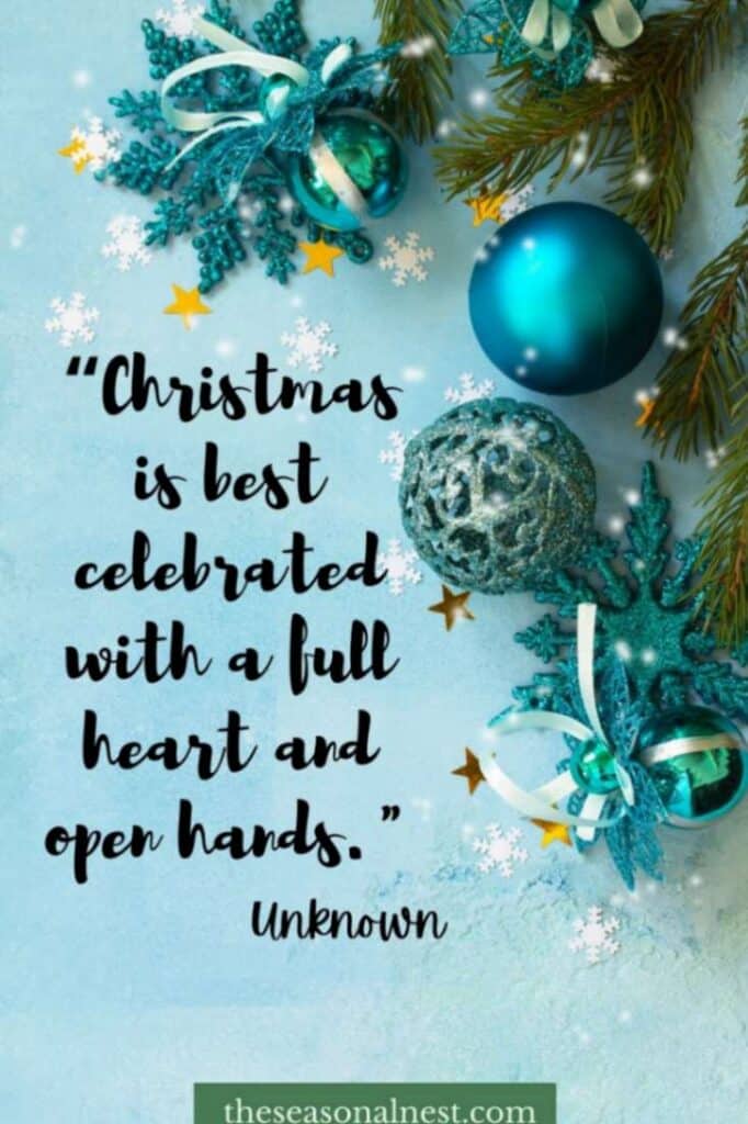 Blue Christmas decor with ornaments and a warm festive quote.