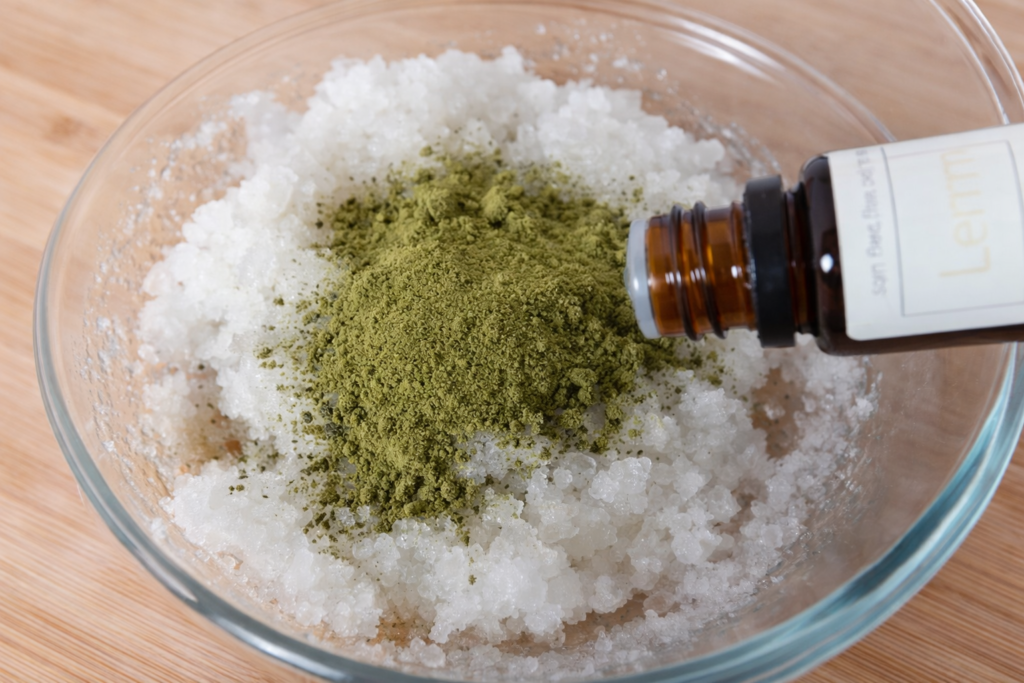 Adding Matcha green tea and essential oil to the mixture.