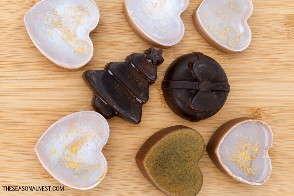 Chocolate DIY lotion bars on a wooden surface.