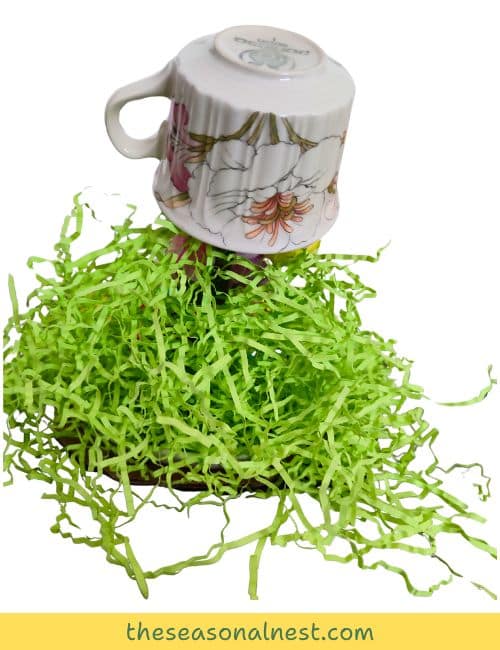 Floating tea cup featuring an upside-down teacup attached to a hidden support, creating a whimsical waterfall effect.