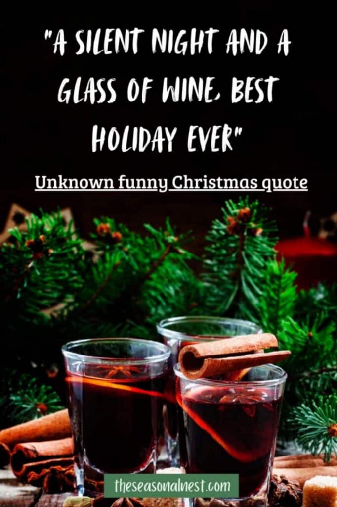 A festive Christmas quote set against a cozy dark background with pine branches. 3 glasses of mulled wine garnished with cinnamon sticks.