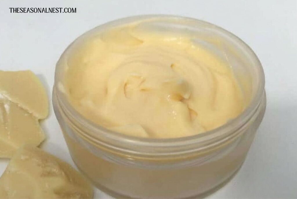 Anti aging cream with cocoa butter in a container.