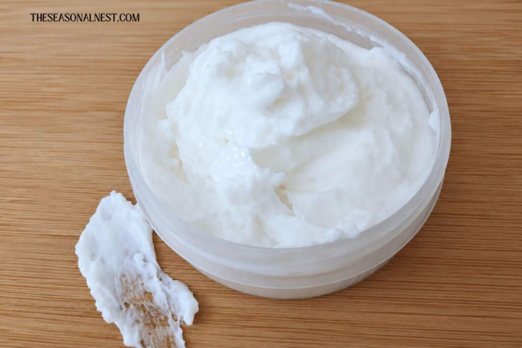 Homemade face aloe vera moisturizer in a container.