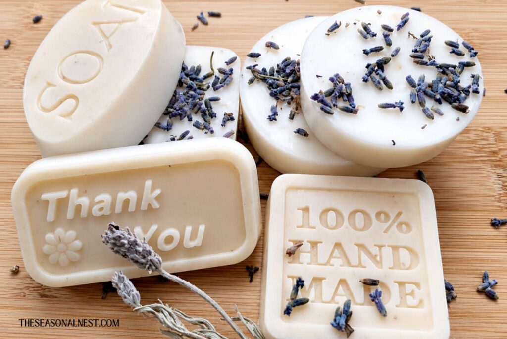 Lavender oatmeal soap bars with lavender seeds and lavender sprigs.