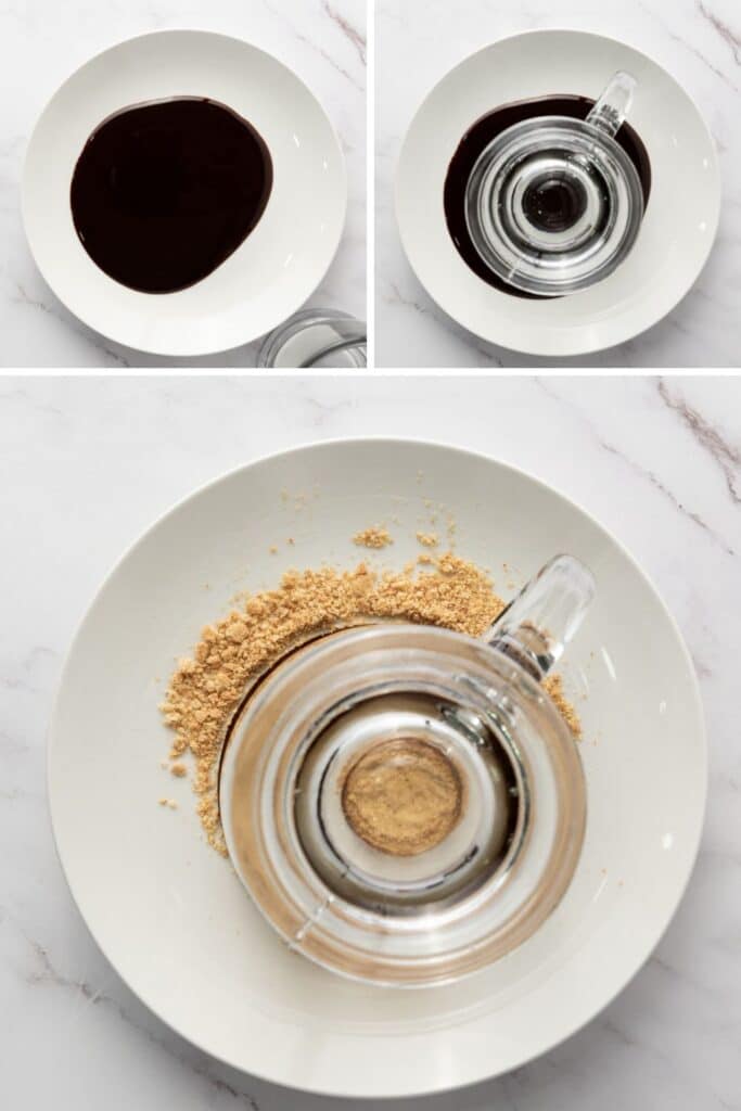 Dipping mug in chocolate sauce and graham crackers.