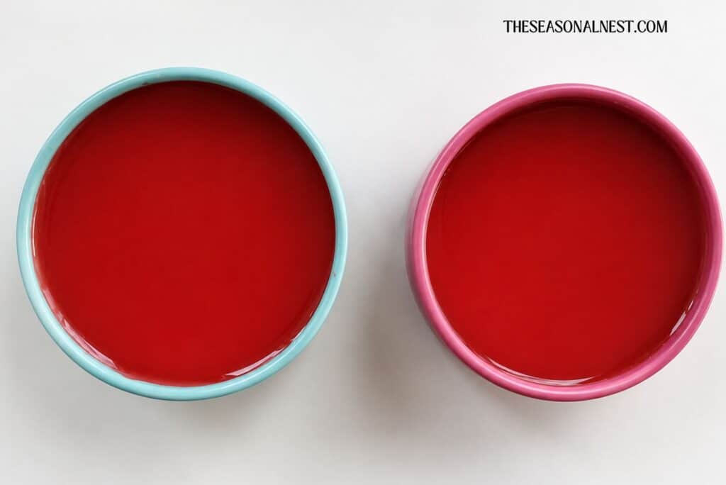 Red liquid lip balm in containers