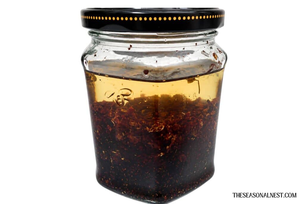 Hibiscus almond-infused oil jar.