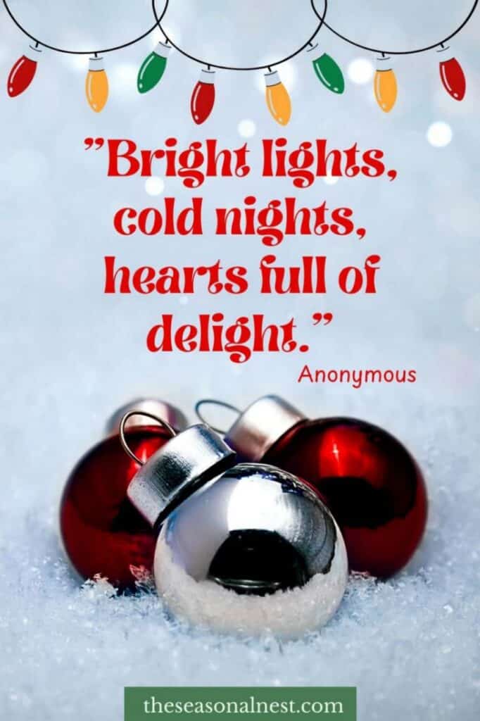 Sparkling Christmas card with red and silver baubles on snow and a short quote.