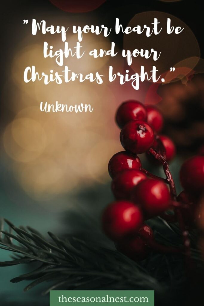 Warm card with a short Christmas quote, red berries, and glowing festive lights.